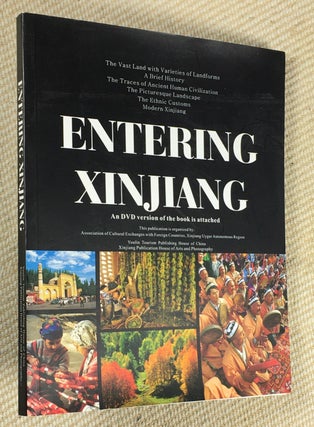 Item #20080120 Entering Xinjiang. Book, with DVD at back. The vast land with varieties of land...