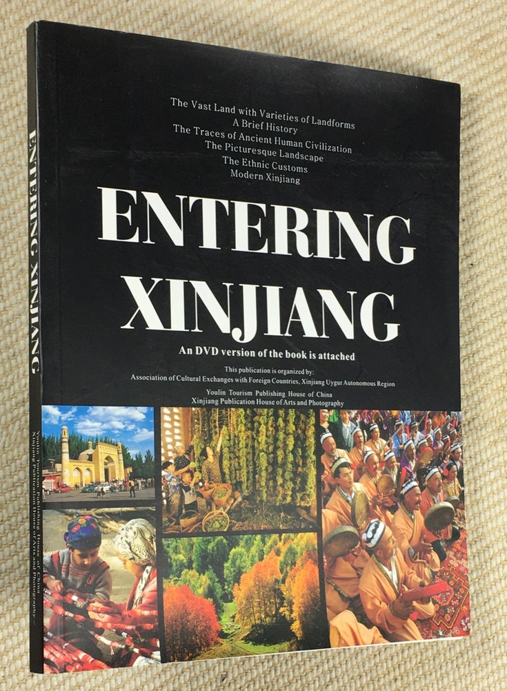 Item #20080120 Entering Xinjiang. Book, with DVD at back. The vast land with varieties of land forms; a brief history; the traces of ancient human civilisation; the picturesque landscape; the ethnic customs; modern Xinjiang. Ding Xiao Lun, aka Ding Xiaolun.